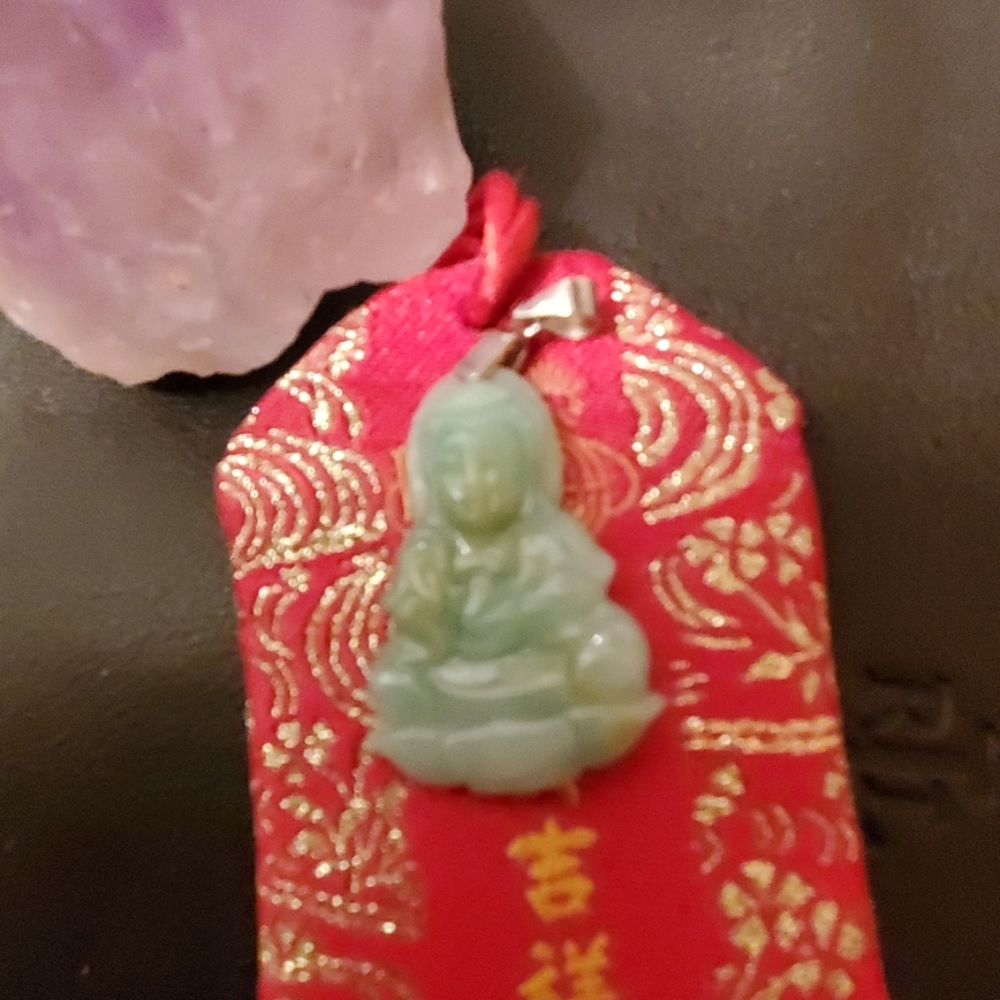 Genuine jade guan yin pendent
